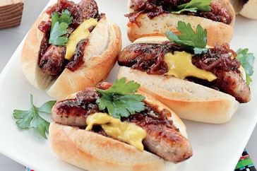 Barbecued sausage rolls with caramelised onions