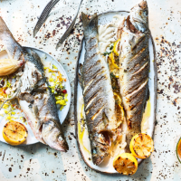Barbecued sea bass with confit shallots and tahini