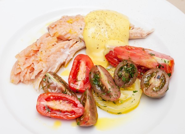 Barbecued trout cooked in newspaper