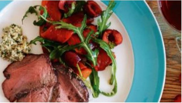 Barbecued venison roast with red capsicum salad and walnut salsa