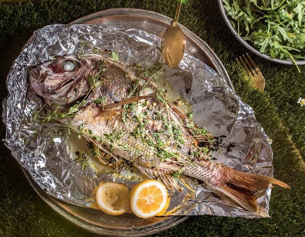 Barbecued whole fish with classic bitter greens salad