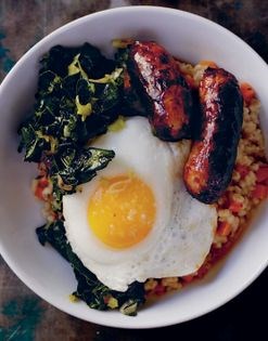 Barley porridge with spring onions, kale, and sausage