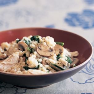 Barley risotto with chicken, mushrooms, and greens