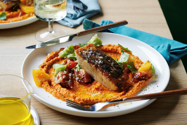 Barramundi with sauce romesco and heirloom tomato