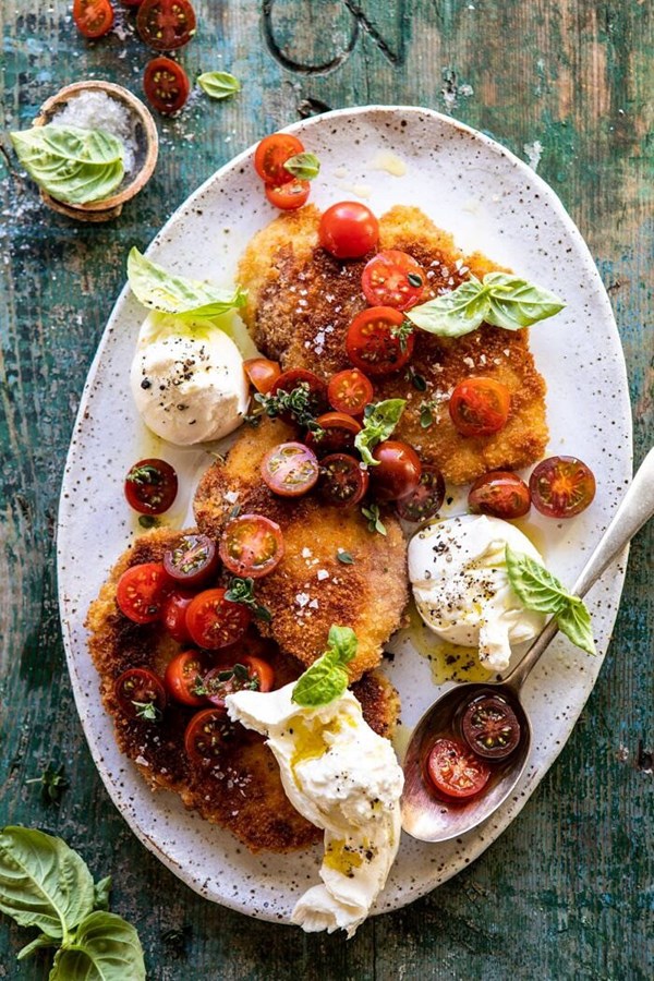 Basil chicken saltimbocca with marinated tomatoes and burrata