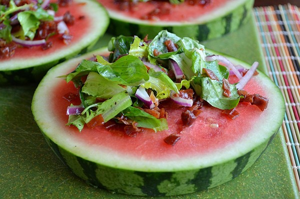 Basil-prosciutto salad on watermelon plates