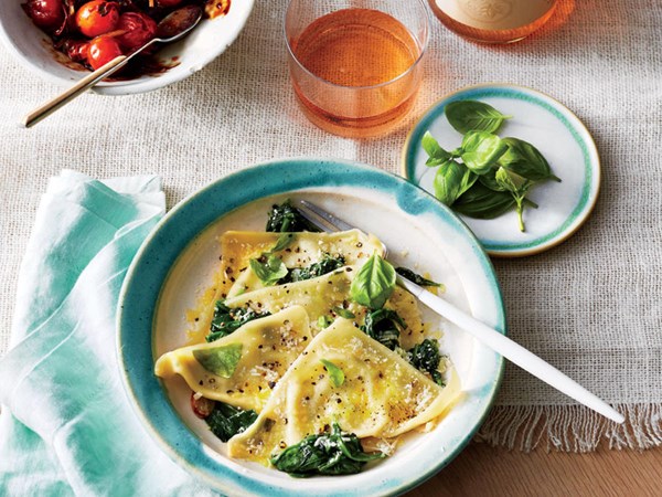 Basil-ricotta ravioli with spinach