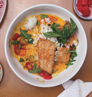 Bass with herbed rice and coconut-vegetable chowder