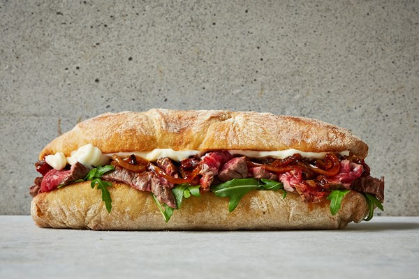 Bavette steak sandwich with sticky harissa onions