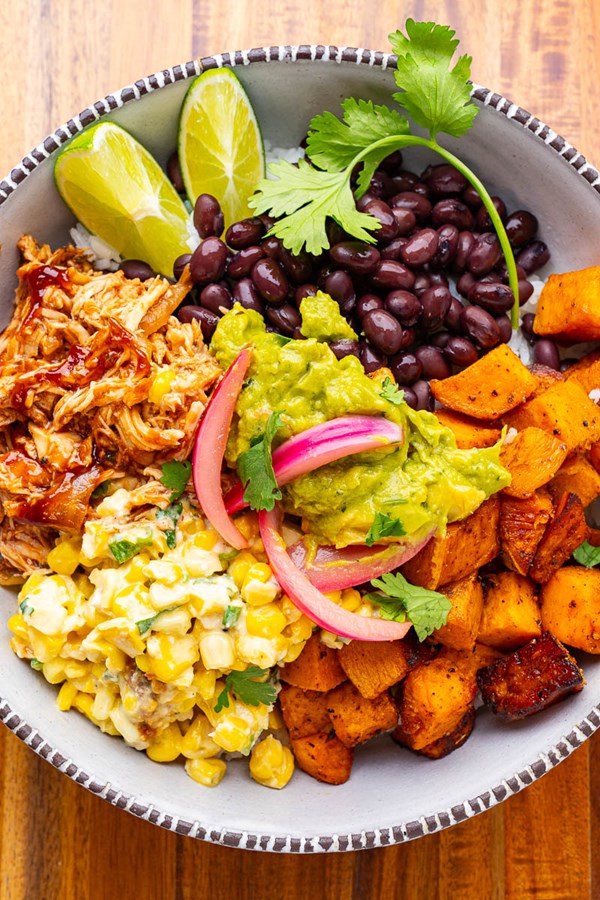 BBQ chicken, street corn and chipotle roast sweet potato bowls