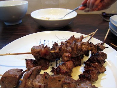 BBQ lamb shoulder kebabs with spicy tomato sauce