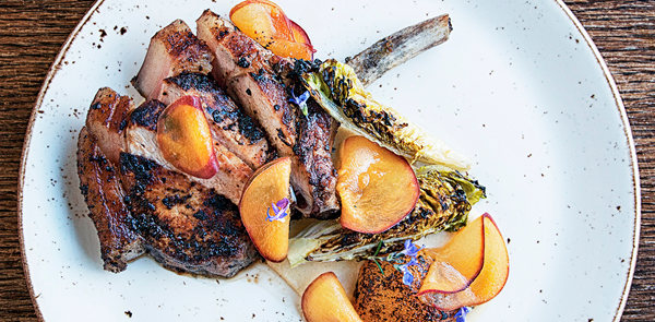 BBQ pork with almond purée and pickled peaches