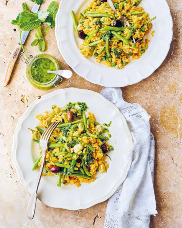 Bean and pea paella with salsa verde