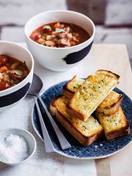 Bean, chorizo and tomato soup with Manchego soldiers