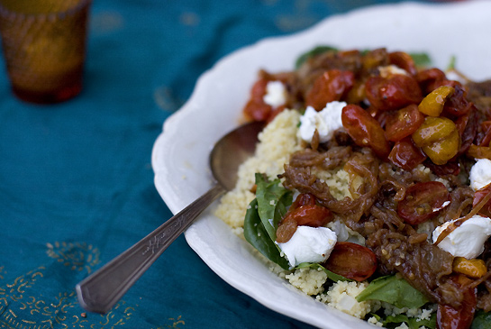 Beautiful bulgar and spinach pilaf with labneh and chili roast tomatoes