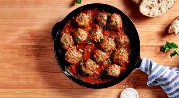 Beef and lamb semolina meatballs in spicy red sauce [Brad Mahlof]