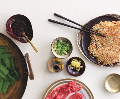 Beef and snow peas with panfried noodles