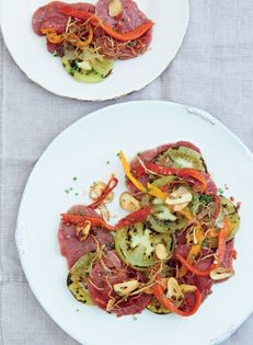 Beef carpaccio, blackened green tomatoes, peppers, crispy ginger, Sichuan chilli oil and crispy garlic