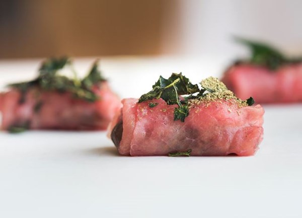 Beef carpaccio canapé with bone marrow and cavolo nero