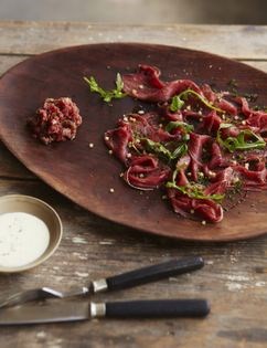Beef carpaccio with beef tartare & wasabi cream