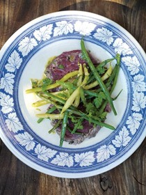 Beef carpaccio with marinated bean salad