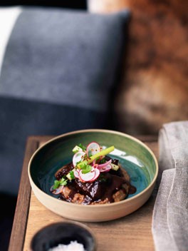 Beef cheeks with radish, mustard seed and pickled celery salad