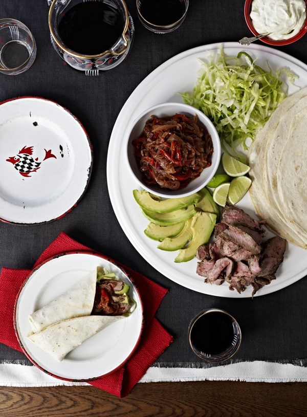 Beef fajitas with caramelised onions and sour cream dressing