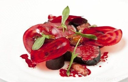 Beef fillet in burnt hay with smoked bone marrow, salt baked and raw beetroot