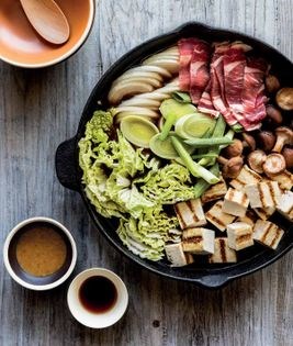Beef, green onions, and vegetables in sweet soy sauce (Sukiyaki)