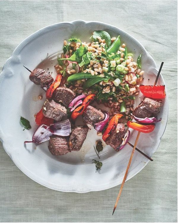 Beef kebabs with peppers, onion, mint, and tahini-yogurt sauce