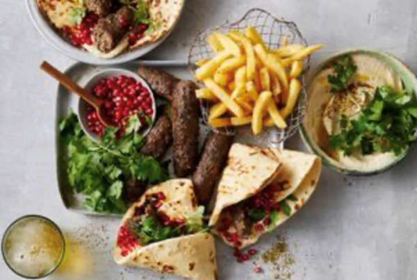 Beef kofta with white bean and almond tarator and pomegranate