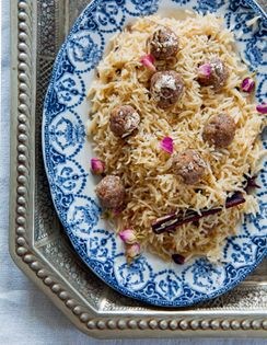 Beef meatball pulao with silver leaf and rose buds