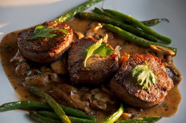 Beef medallions with Madeira mushroom sauce and haricot verts