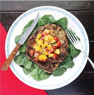 Beef Milanesa with peach salsa and spinach