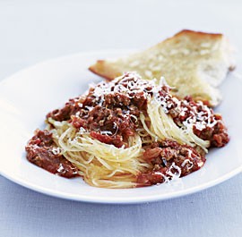 Beef ragù over spaghetti squash with garlic bread