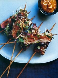 Beef satay with peanut sauce and herb salad