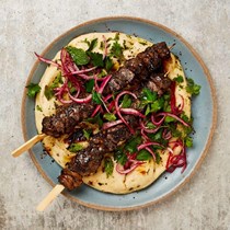 Beef skewers with dried lime and sumac onions