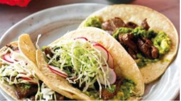 Beef tacos with smashed avocado and salsa verde
