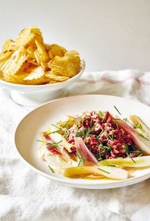 Beef tartare, oyster aioli, pickled baby onions, and potato chips