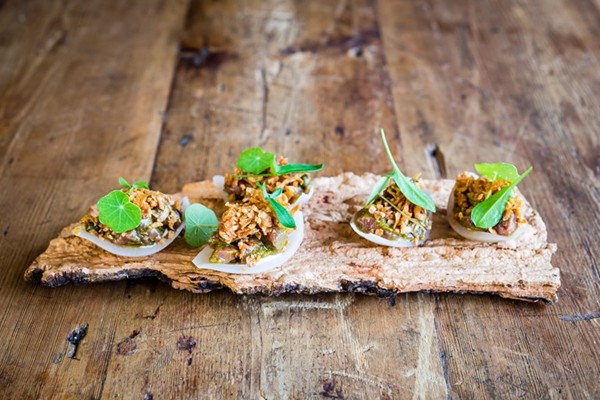 Beef tartare with sour onions and oyster emulsion