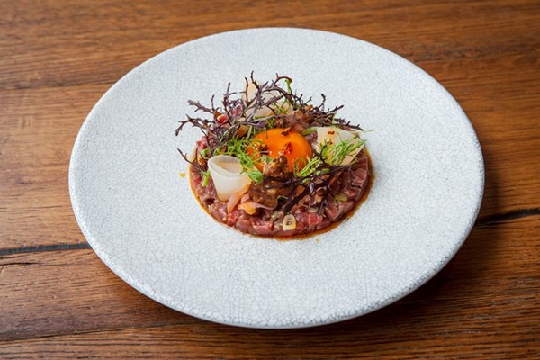  Beef tartare with soy-glazed egg yolk