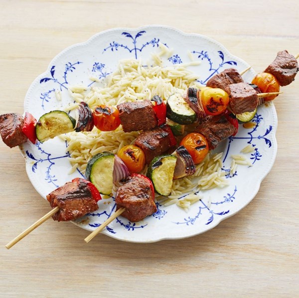 Beef-vegetable kebabs with orzo