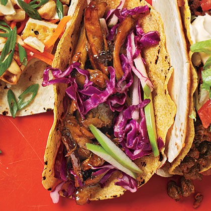 Beer-braised chicken tacos with cabbage slaw