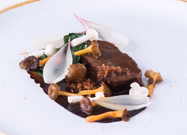 Beer-braised Irish beef cheek, three-corner garlic, chanterelles, onions cooked in whey