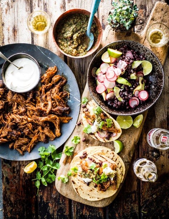 Beer-braised lamb tacos with charred green tomato salsa