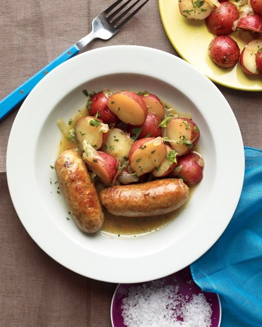 Beer-braised sausages with warm potato salad