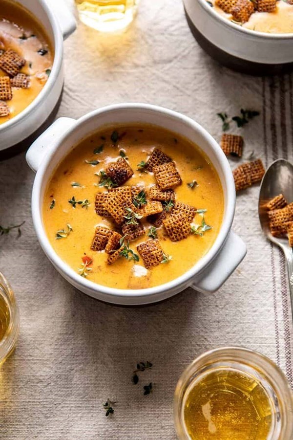 Beer cheese soup with chili spiced Chex mix