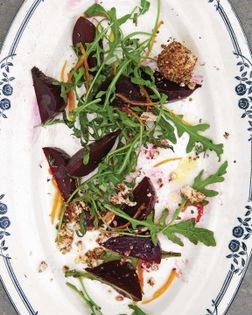 Beet, arugula, and shanklish salad with kumquat and orange dressing