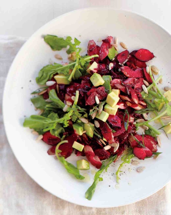 Beet, avocado, and arugula salad with sunflower seeds