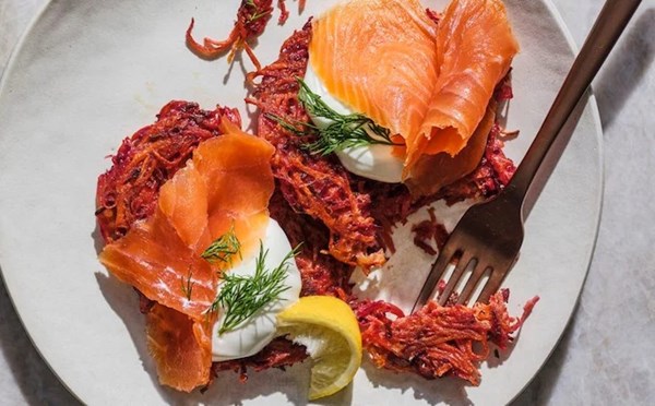Beet, carrot and potato fritters with smoked trout and dill